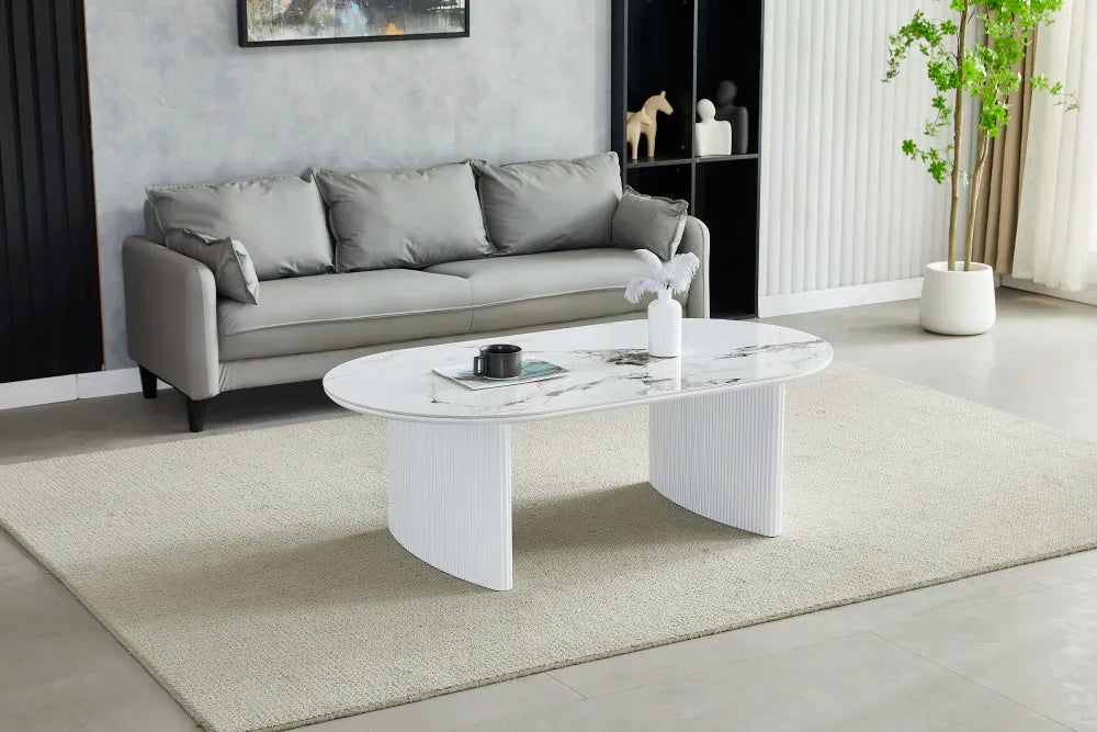 Table basse JOSEPHINE en céramique ovale #couleur_marbre-beige